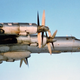 Illustration for article titled Cold War 2.0 As Russian Bears Buzz Carrier, Subs Snoop Around Seabed Cables